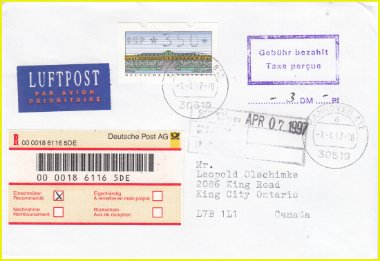 Einschreiben ins Ausland mit dem neuen Barcode-Label vom ersten Tag (1. April 1997 vom Versuchsstandort 30519 Hannover 812) - Teilbarfreimachung durch Abgabe eines internationalen Antwortscheins - vorne noch Ankunftsstempel aus Kanada