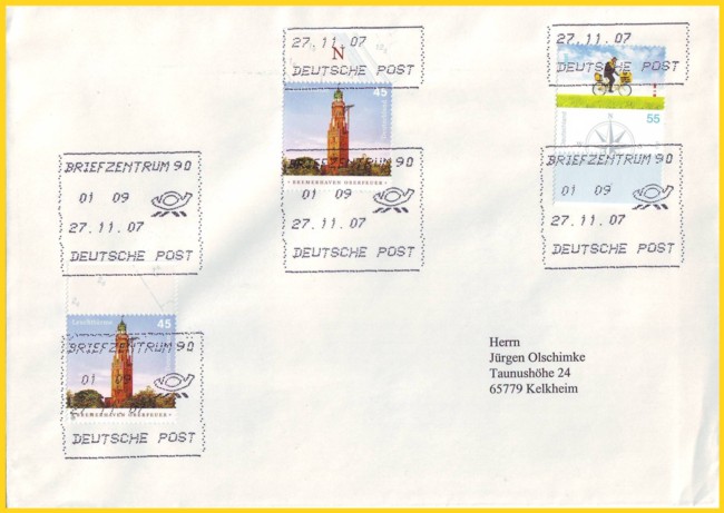 Großbrief vom ersten Tag (27. November 2007) der Tintenstrahlentwertung im Briefzentrum 90 in Nürnberg von der Maschine der Firma Solistic - Oben gut zu sehen ist das sogenannte "Clipping" (das elektronische Abschneiden des Stempelabdrucks)